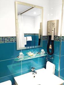 Koupelna v ubytování Hotel Saint-Aignan