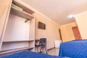 Μια τηλεόραση ή/και κέντρο ψυχαγωγίας στο Alfa Hotel Vespasiano