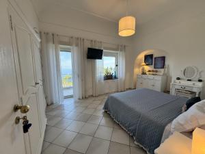 Llit o llits en una habitació de Villa Azul