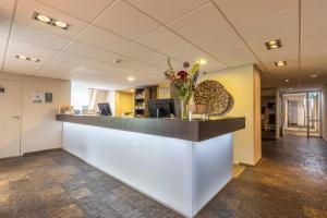 Vstupní hala nebo recepce v ubytování Fletcher Zuiderduin Beachhotel + 37 fotografií