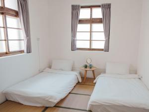Letto o letti in una camera di 東衛參捌 陶藝旅店