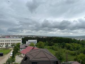 an overhead view of a building and a city at Luxury Nordic 46 Apartment in Suceava