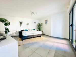 Posteľ alebo postele v izbe v ubytovaní Le Cocon - 2 pièces centre Cannes - Terrasse