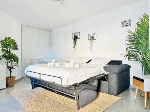 Posteľ alebo postele v izbe v ubytovaní Le Cocon - 2 pièces centre Cannes - Terrasse
