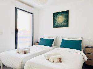 Posteľ alebo postele v izbe v ubytovaní Le Cocon - 2 pièces centre Cannes - Terrasse
