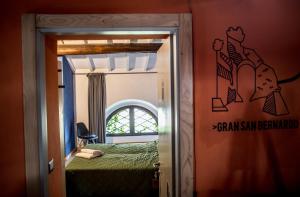 Postel nebo postele na pokoji v ubytování S'Osteria 38