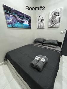 Postel nebo postele na pokoji v ubytování Matsurika Guest House - Kulim