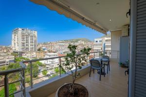 a balcony with a view of a city at The View Luxury Apartment Center in Sarandë