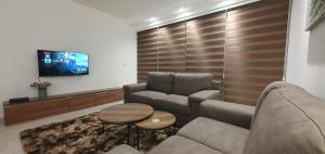 Χώρος καθιστικού στο Centre Point Comfort Apartment