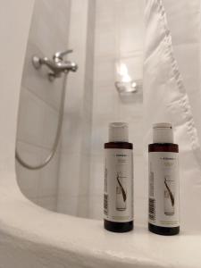 Koupelna v ubytování Sidra Hotel + 37 fotografií