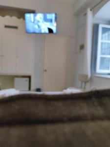 TV a/nebo společenská místnost v ubytování Sidra Hotel