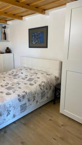 a bedroom with a bed in a room at Goričko view house in Križevci