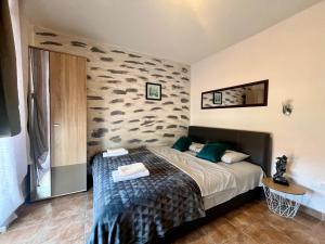 En eller flere senger på et rom på Apartments Obradovic