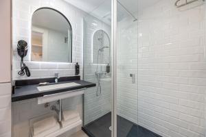 Koupelna v ubytování Hotel Vibra Palma Cactus