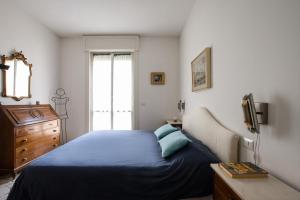 Ένα ή περισσότερα κρεβάτια σε δωμάτιο στο Arco della Pace Nest - Moscova - Milan-Cortina 2026 Olympics - Milan Design Week 2026