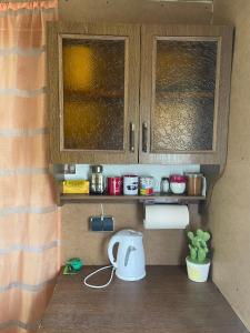 a toy kitchen with a counter and a sink at Grandma's summer house in Ludza