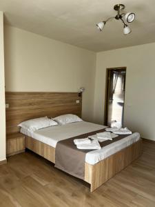 Postel nebo postele na pokoji v ubytování Vila Seimos