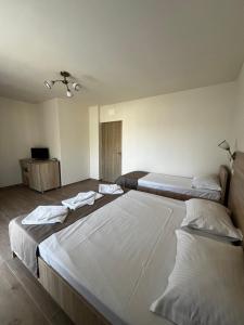 Postel nebo postele na pokoji v ubytování Vila Seimos