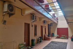 Fotografija v galeriji nastanitve Reddoorz at Griya Kampar Madiun v mestu Madiun