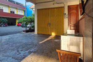 Fotografija v galeriji nastanitve Reddoorz at Griya Kampar Madiun v mestu Madiun