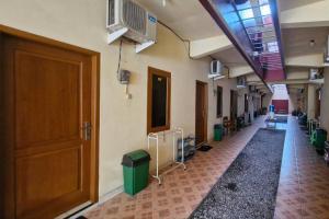 Fotografija v galeriji nastanitve Reddoorz at Griya Kampar Madiun v mestu Madiun