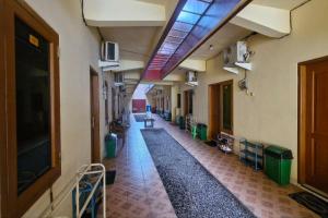 Fotografija v galeriji nastanitve Reddoorz at Griya Kampar Madiun v mestu Madiun