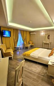 TV a/nebo společenská místnost v ubytování Grand Hotel Baroc