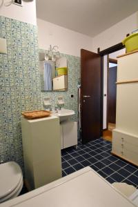 Koupelna v ubytování Dolomiti 3-TRE Appartamento + 56 fotografií