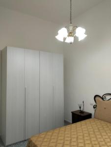 Postel nebo postele na pokoji v ubytování Orchidea