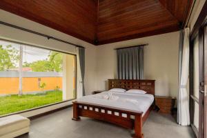Luxury Thai Style Swimming Pool Villa, Private housekeeper,6 Bedrooms客房内的一张或多张床位