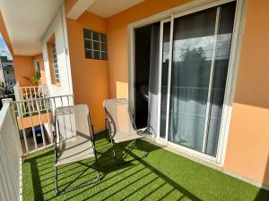 Ein Balkon oder eine Terrasse in der Unterkunft Villa 4 ch 140 m2 avec vue sur mer et le tombolo