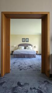 Postel nebo postele na pokoji v ubytování Relais de Margaux - Hôtel, Golf & Spa