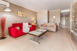 Posezení v ubytování Vue imprenable sur le lagon, appartement 1ch 4p