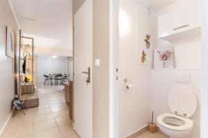 Vannituba majutusasutuses Vue imprenable sur le lagon, appartement 1ch 4p