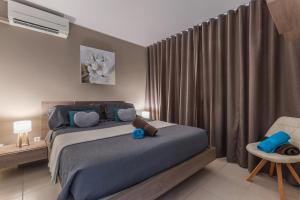 Voodi või voodid majutusasutuse Vue imprenable sur le lagon, appartement 1ch 4p toas