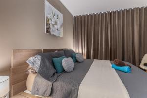 Voodi või voodid majutusasutuse Vue imprenable sur le lagon, appartement 1ch 4p toas