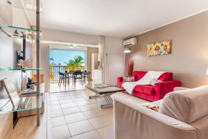 Posezení v ubytování Vue imprenable sur le lagon, appartement 1ch 4p + 29 fotografií