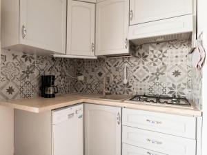 Kuchyň nebo kuchyňský kout v ubytování Sussurro Di Corrente - cozy studio flat with Lake view + 2 fotografie