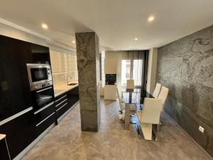 Kuchyň nebo kuchyňský kout v ubytování Apartamentos Calypso Altamar