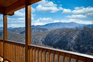a view of the mountains from the balcony of a cabin at The Bear and Trout by Stony Brook Cabins in Gatlinburg