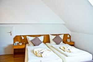 Säng eller sängar i ett rum på Baltic Kölln Appartement