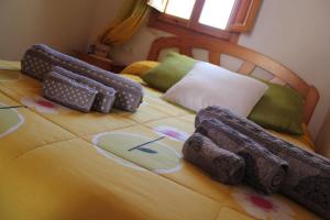 Ένα ή περισσότερα κρεβάτια σε δωμάτιο στο Casa Rural Papi