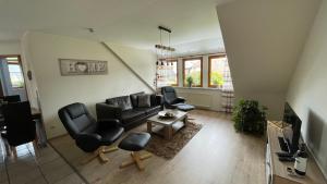 TV a/nebo společenská místnost v ubytování wunderschöne "Ferienwohnung-Simmerath" Eifel NordEifel Nationalpark
