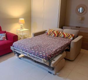 Voodi või voodid majutusasutuse Vue imprenable sur le lagon, appartement 1ch 4p toas