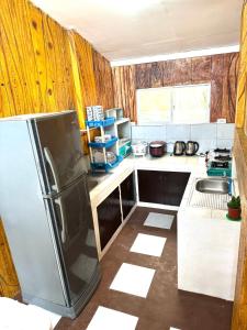 Virtuvė arba virtuvėlė apgyvendinimo įstaigoje La Oviedo Villas Resort Boracay