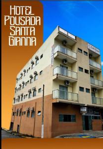 ein Hotel pueblo spin inn wird gezeigt in der Unterkunft Pousada Santa Gianna in Aparecida