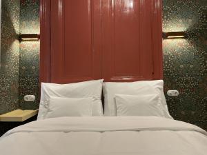 Posteľ alebo postele v izbe v ubytovaní Metropolis Budapest Boutique Hotel