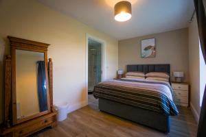 Letto o letti in una camera di Carrig Island Lodge