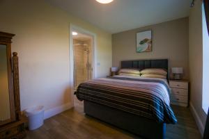 Letto o letti in una camera di Carrig Island Lodge