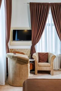 Гостиная зона в La Strada Boutique Villa